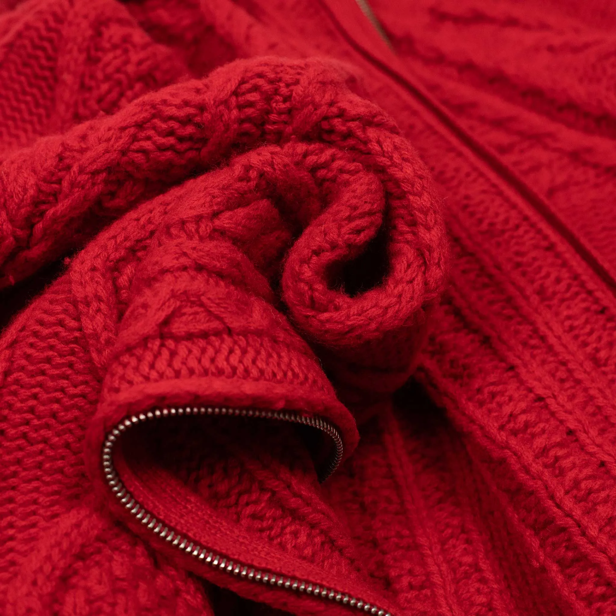 Cabled zip jacket in red wool and cashmere